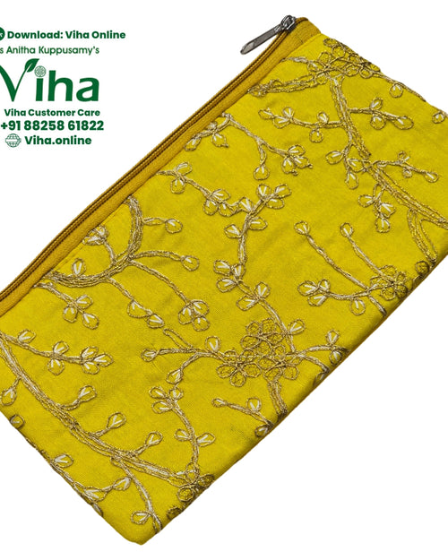 Designer Purse with embroidery and a zipper closure