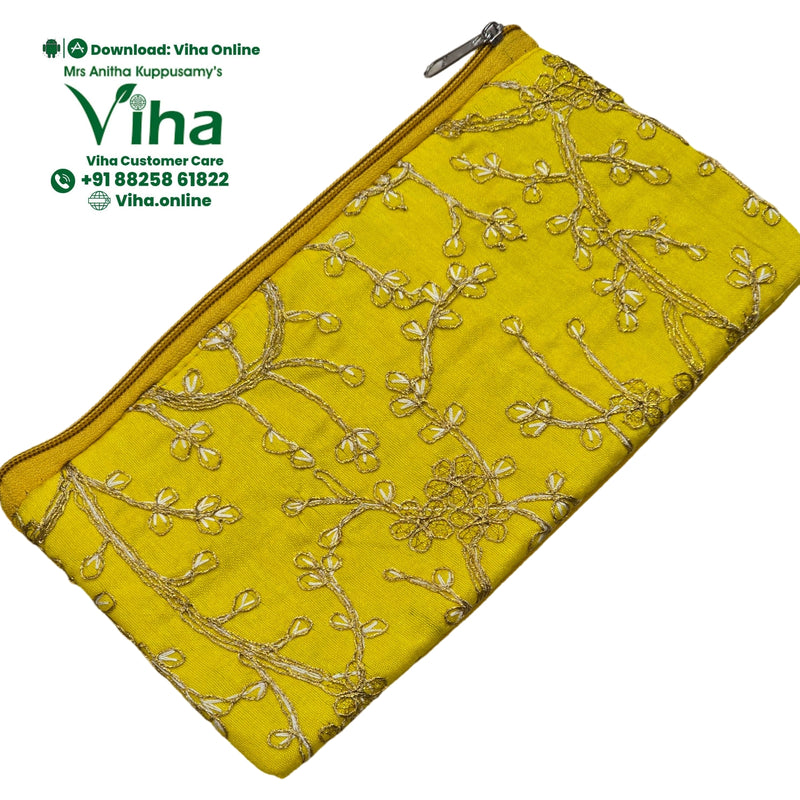 Designer Purse with embroidery and a zipper closure