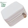 Travelling Jewel Case, a small white textured square zipped case with one silver-toned rectangular pull tab