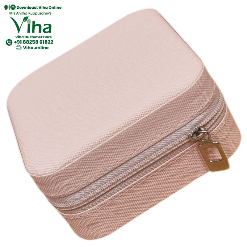 Travelling Jewel Case, a pink textured square case with a grey zipper and one gold-toned rectangular zipper pull