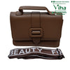 Trendy & Stylish Sling Bag For Ladies, a brown rectangular handbag with top handle, front strap, and folded patterned strap below