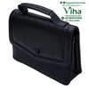 Sling Bag For Ladies, a black textured rectangular bag with a top handle and a flap closure featuring one round button