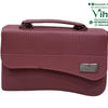 Sling Bag For Ladies, a textured dark pink rectangular handbag with a short top handle, a curved front flap, and one silver-toned rectangular brand badge