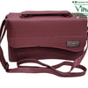 Sling Bag For Ladies, a maroon textured rectangular handbag with a top handle, shoulder strap, flap closure, and a small metal brand tag