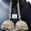 White Metal Long Jhumka, two long silver-toned jhumka earrings featuring peacock studs and beaded chains