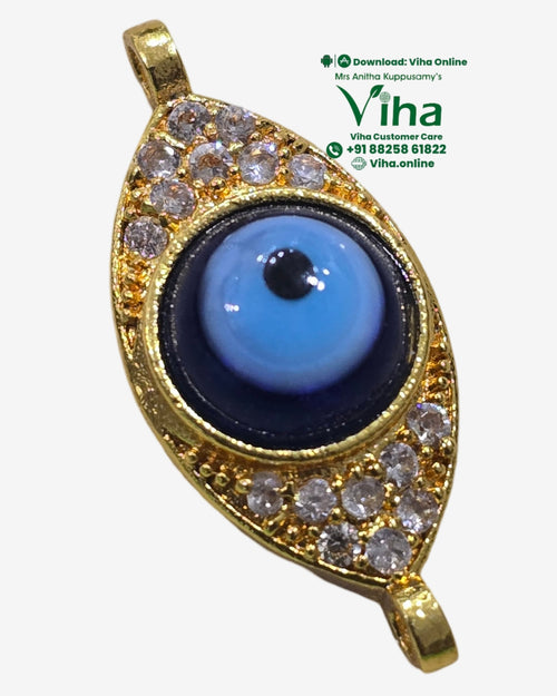 Evil Eye Pendant - Brass, a gold-toned pendant set with clear stones and a central blue eye motif featuring a black pupil and white border