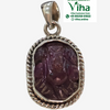 Ruby Ganesha Silver Pendant, a shiny silver-toned pendant with an oval purple carved stone in a rope-textured frame and bail