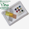 Vastu Panchaloha Set, a white plastic box containing four metallic squares and ten assorted colorful stones arranged on a white insert