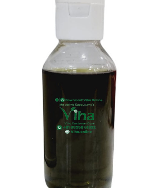 Vallarai Oil (Brahmi oil) for external use, a clear bottle of dark oil with a white flip-top cap