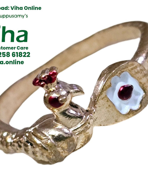 Impon Vel Mayil Ring, circular band with an ornamental peacock figurine