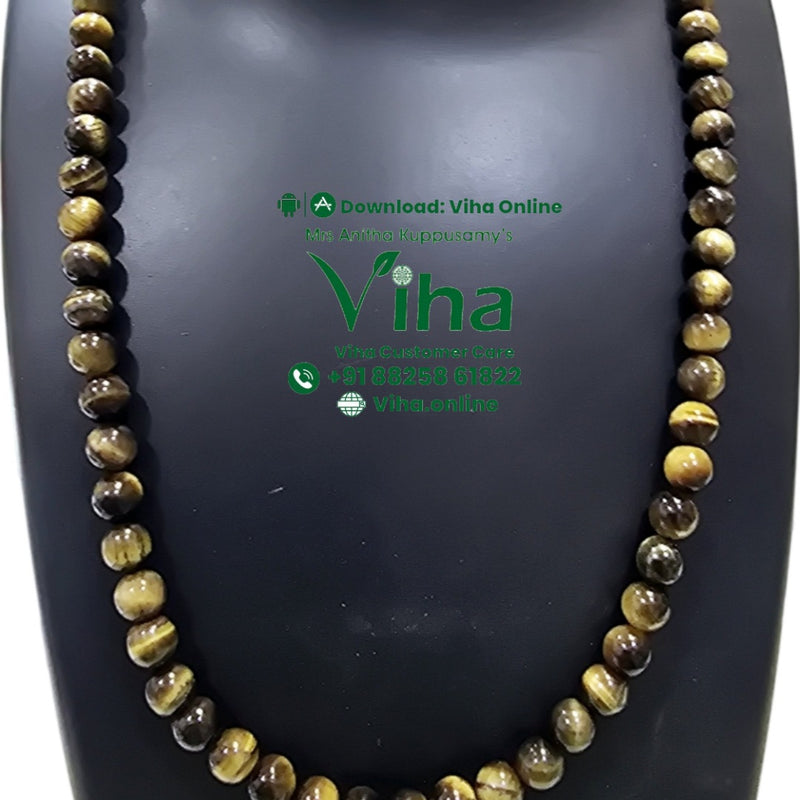 Tiger Eye Mala, beaded strand with a variegated pattern