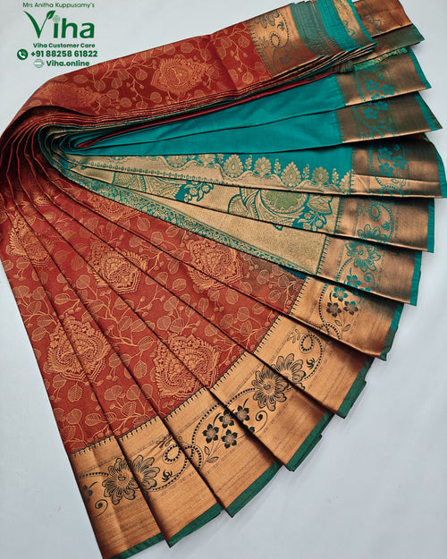Silk Saree, a pleated red and teal fabric with gold-toned borders and floral patterns