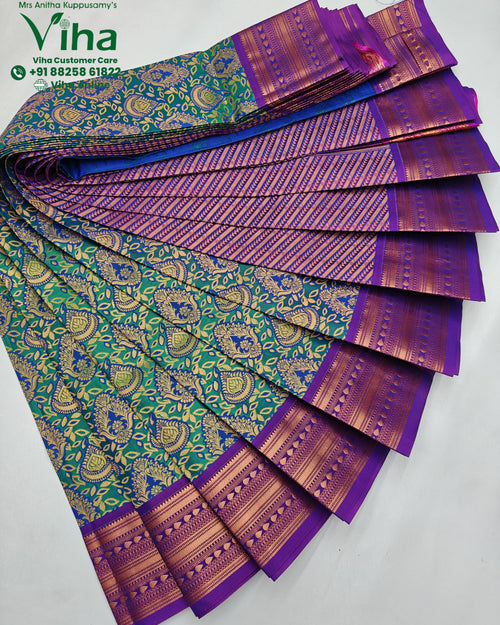 Semi Silk Saree, a folded fabric with purple border, green and blue body, gold-toned paisley patterns, and textured woven stripes