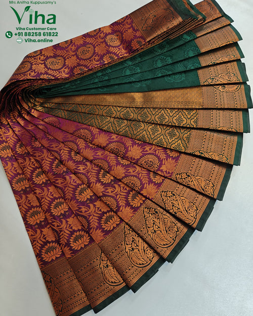 Semi Silk Saree, a purple and green folded fabric with shiny gold-toned floral patterns and borders arranged in a fan shape