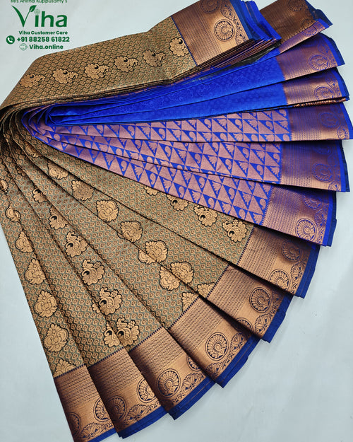 Semi Silk Saree, folded blue and gold-toned patterned fabric arranged radially on a white surface