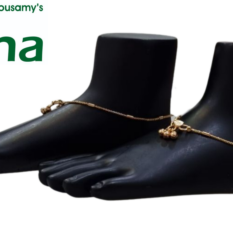 Impon Kolusu, gold-toned anklets with a hanging ball charm worn on mannequin feet
