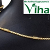 Impon Anklets, a shiny gold-toned anklet with a textured chain, tube-shaped links, and three dangling round charms on a dark ankle model