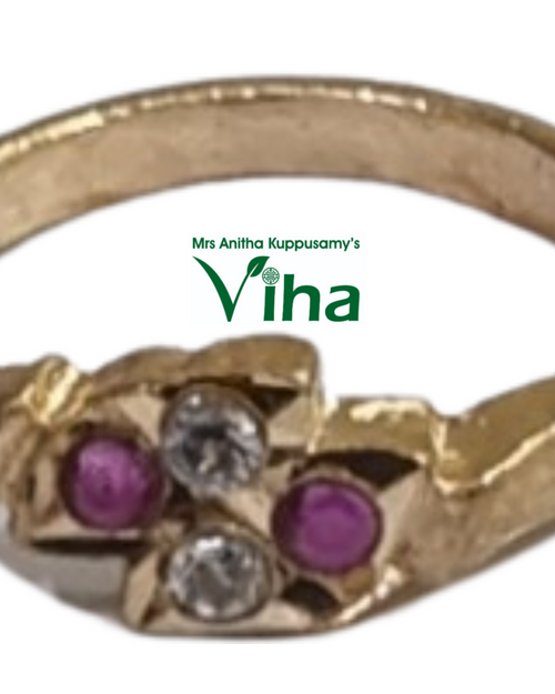 Impon Ring with an ornate cluster, two pink stones and two clear stones