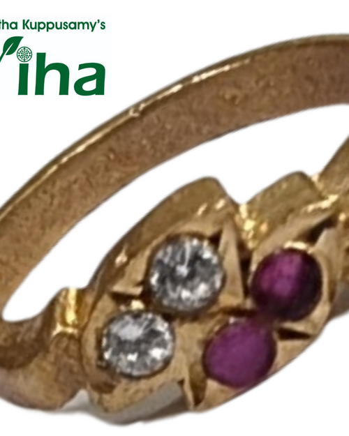 Impon Ring, band with a clustered top and clear and magenta stones