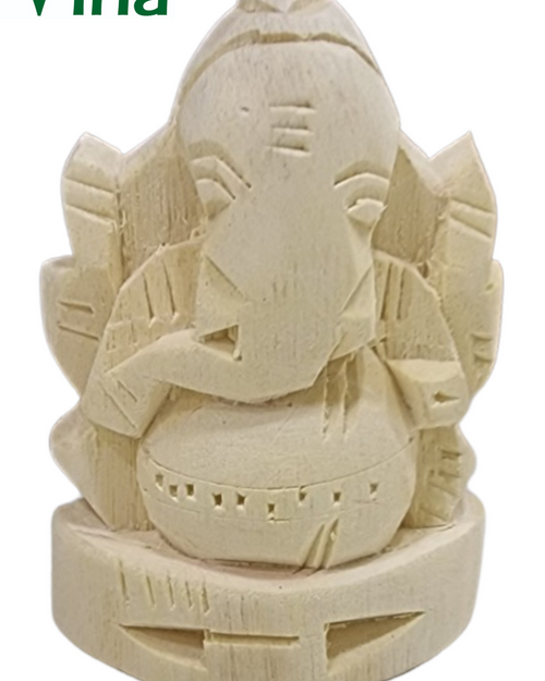 Vellerukku Vinayagar Original / Shwetark, carved light-beige wooden figurine with an elephant-headed humanoid form on a rounded base