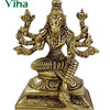 Varahi Amman Statue, a gold-toned metallic figurine of a seated multi-armed entity with an animal head, mounted on a square stepped base