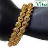 Impon Bangle with interlocking teardrop pattern and clear stones