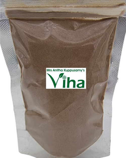 Tamarind Powder For Cooking, a brown powder in a clear resealable pouch with a white rectangular label centered on the front