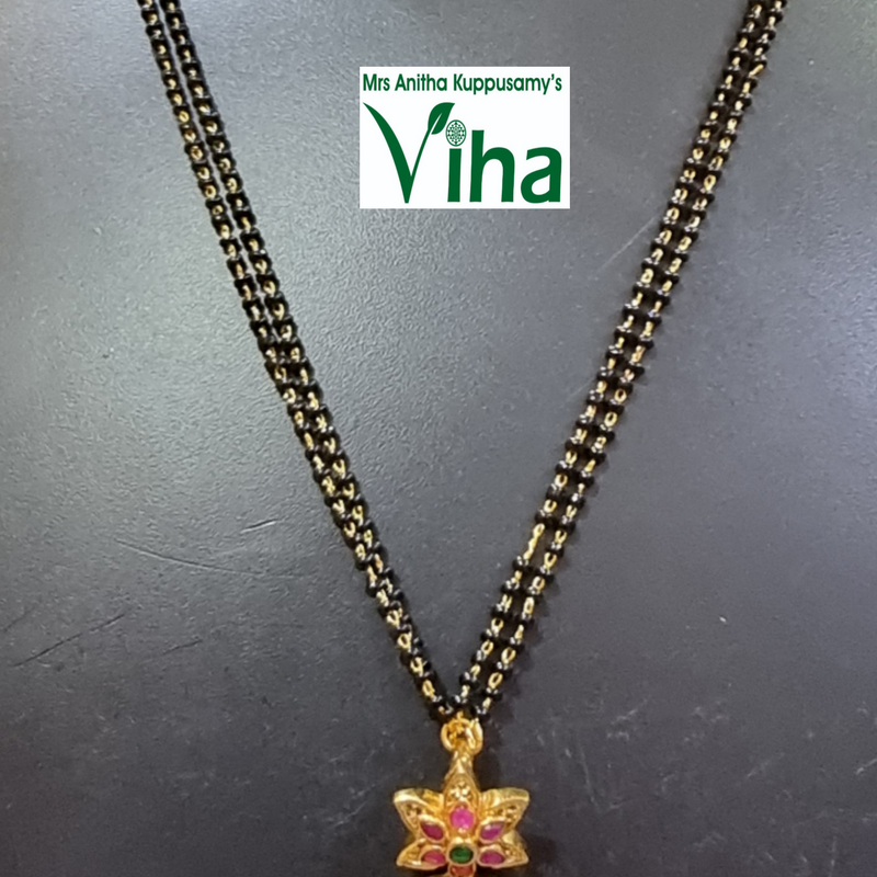 Chain with Black Beads and ornate floral pendant
