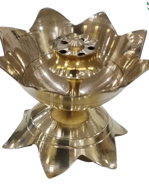 Incense Stick Holder, a shiny gold-toned metallic lotus-shaped vessel featuring ten petal points and a small central pedestal base with five openings
