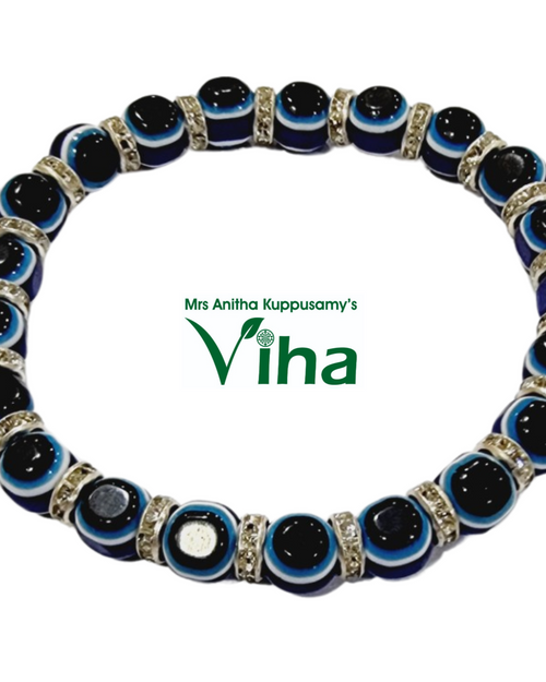 Unisex Evil Eye Bracelet With Stones and concentric circle bead patterns