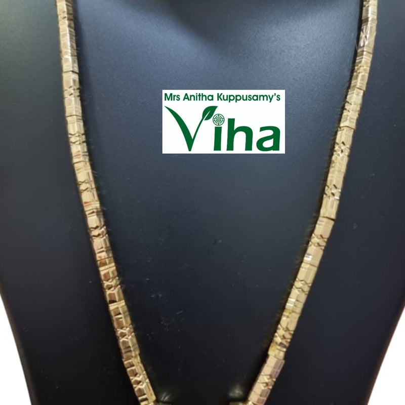 Impon Thali Set With Nanal Kuzhai, a gold-toned chain with a rectangular pendant on a black bust