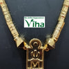 Impon Thali Set With Nanal Kuzhai, a gold-toned chain with round beads supports a rectangular pendant with raised symbols and a pointed base