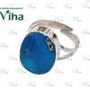 Turquoise Ring Silver Adjustable, a metallic ring features a large, oval, blue stone with mottled dark markings and a polished surface finish
