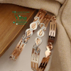 Designer Bangle with interlocking leaf-shaped links