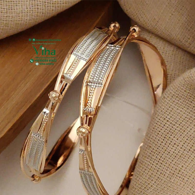 Designer Bangle, a hinged band dotted with small round beads