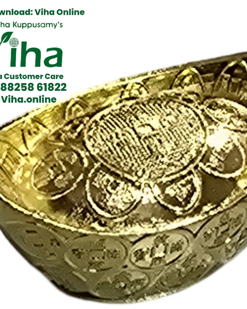 Fengshui Ingot, a shiny gold-toned boat-shaped ingot embossed with circular coin motifs and a central patterned crest