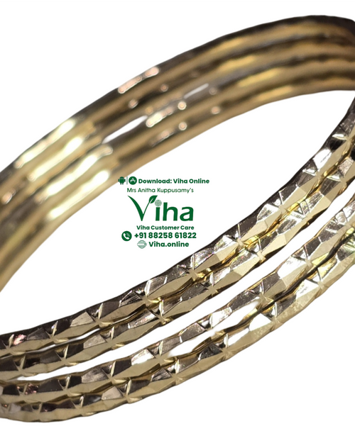 Impon Bangle with faceted outer surface