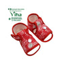 Baby Booties Adjustable 3 to 12 months, a pair of red patterned baby booties featuring white text print and a single white button closure on each