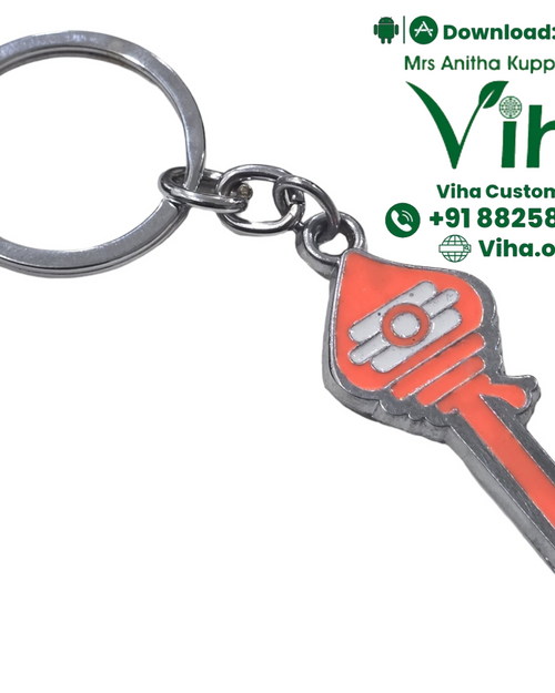 Vel Keychain - Orange, pendant attached to a split ring