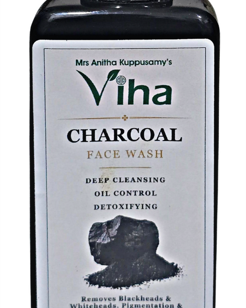 Charcoal Face Wash, a rectangular black bottle with a glossy cap features a white rectangular label displaying black and brown text and a charcoal lump graphic