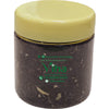 Cardamom Tea in a clear plastic jar with a yellow lid