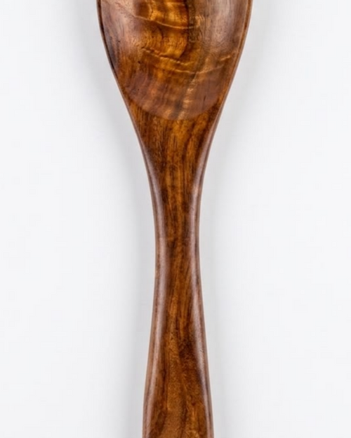 Wooden Spatula, a brown-grained wooden salad server with a smooth polished finish featuring a rounded bowl split by three vertical tines and one hanging hole