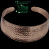 Metal Necklace, a wide, glossy copper-toned metal cuff with a rounded, hammered texture and curved open ends