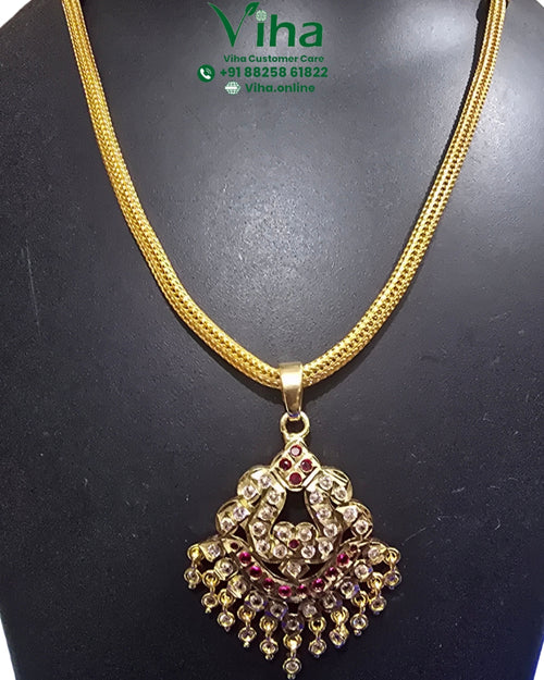 Impon Attiyal with a decorative pendant and hanging elements