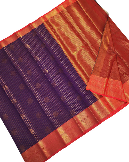 Semi Soft Silk Saree With Blouse, a purple fabric with gold-toned motifs and a red border