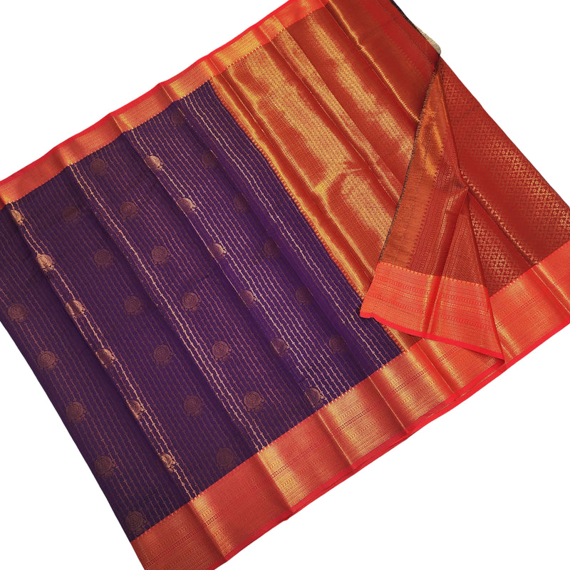 Semi Soft Silk Saree With Blouse, a purple fabric with gold-toned motifs and a red border
