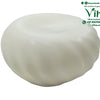 Viha's Butter Soap - Handmade, a smooth, off-white, rounded, swirled bowl-like object with a matte finish rests against a white background