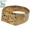 Impon Ring, a gold-toned ring featuring a textured band and a flat square face with engraved motifs