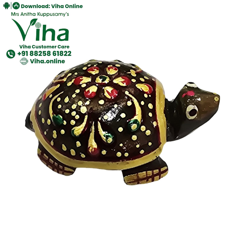 Jade Designer Tortoise, a dark brown tortoise figurine with a glossy finish, painted with yellow, red, and green floral patterns and white dots