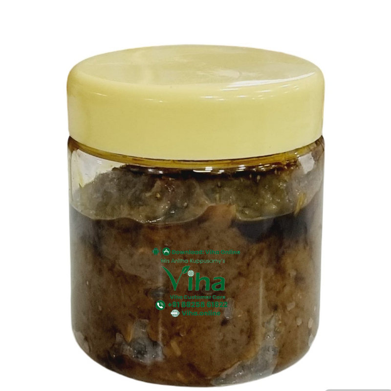 Kothamalli Thokku | Coriander Leaf Thokku in a glass jar